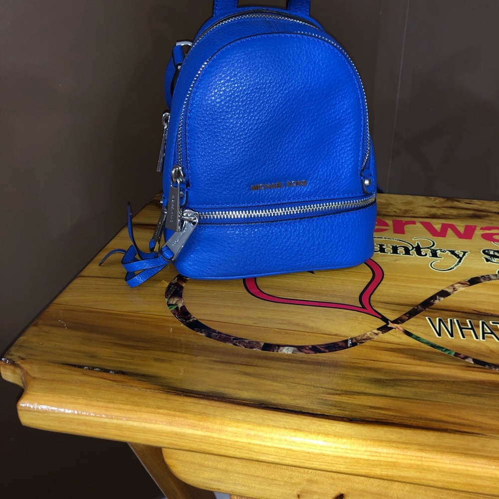 Michael Kors Rhea Zip XS Messenger Backpack